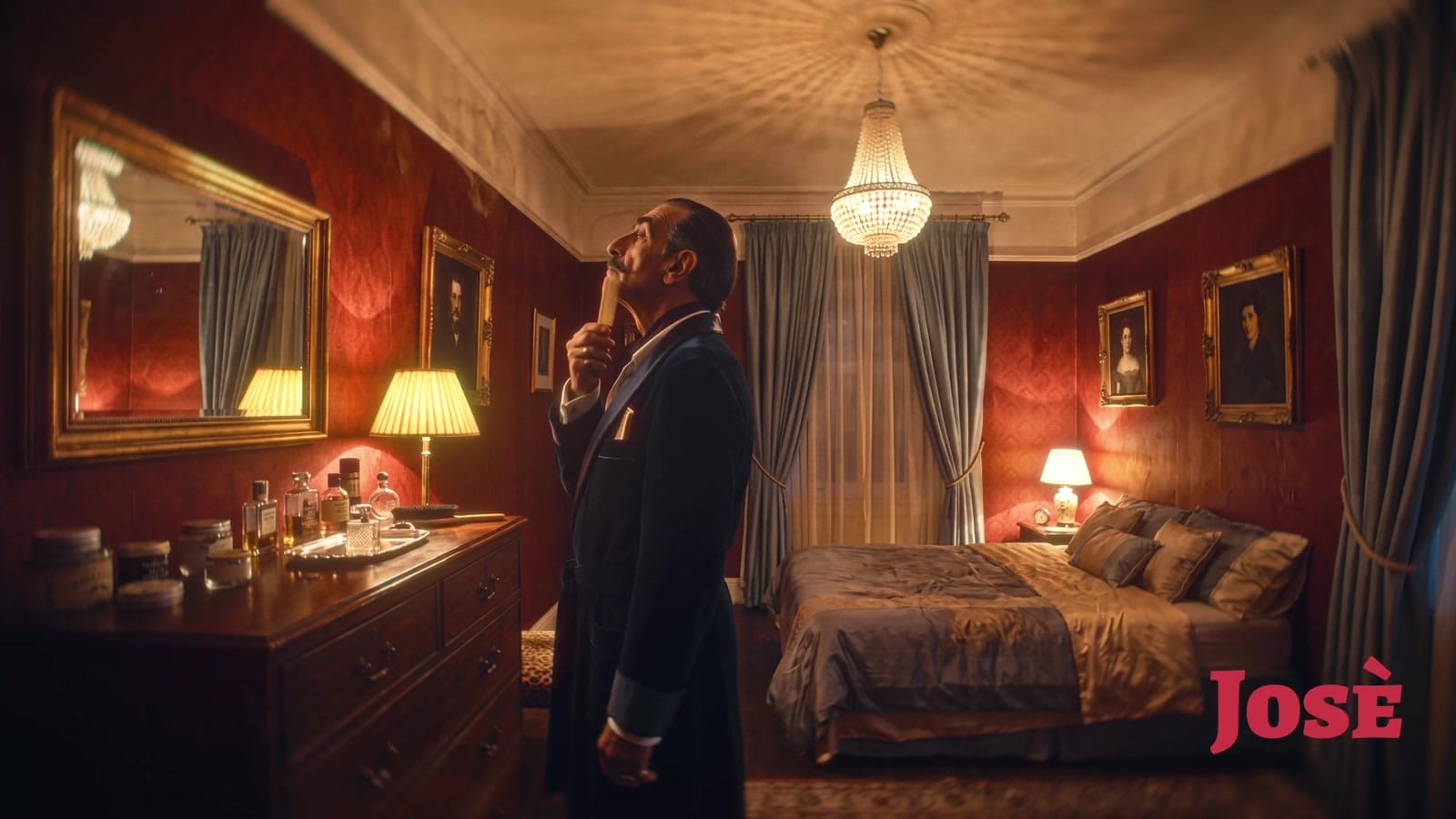 José shaving in a red bedroom