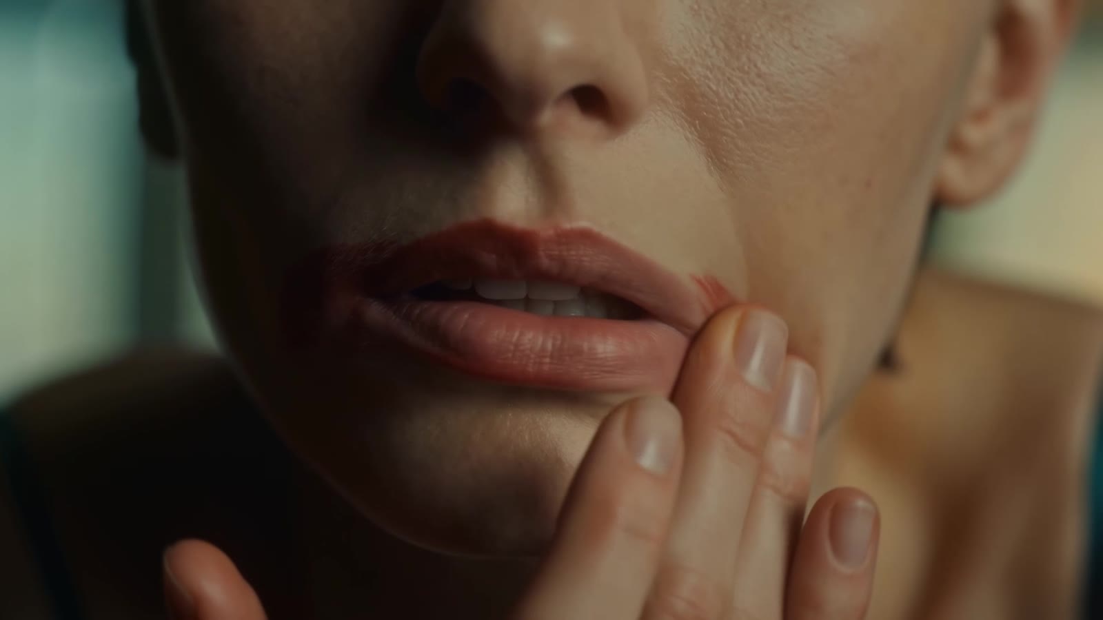 Macro of lips and fingertips